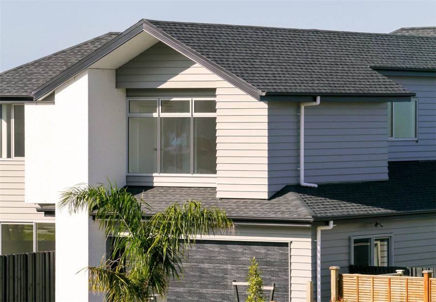 Modern home with charcoal GAF asphalt shingle roof